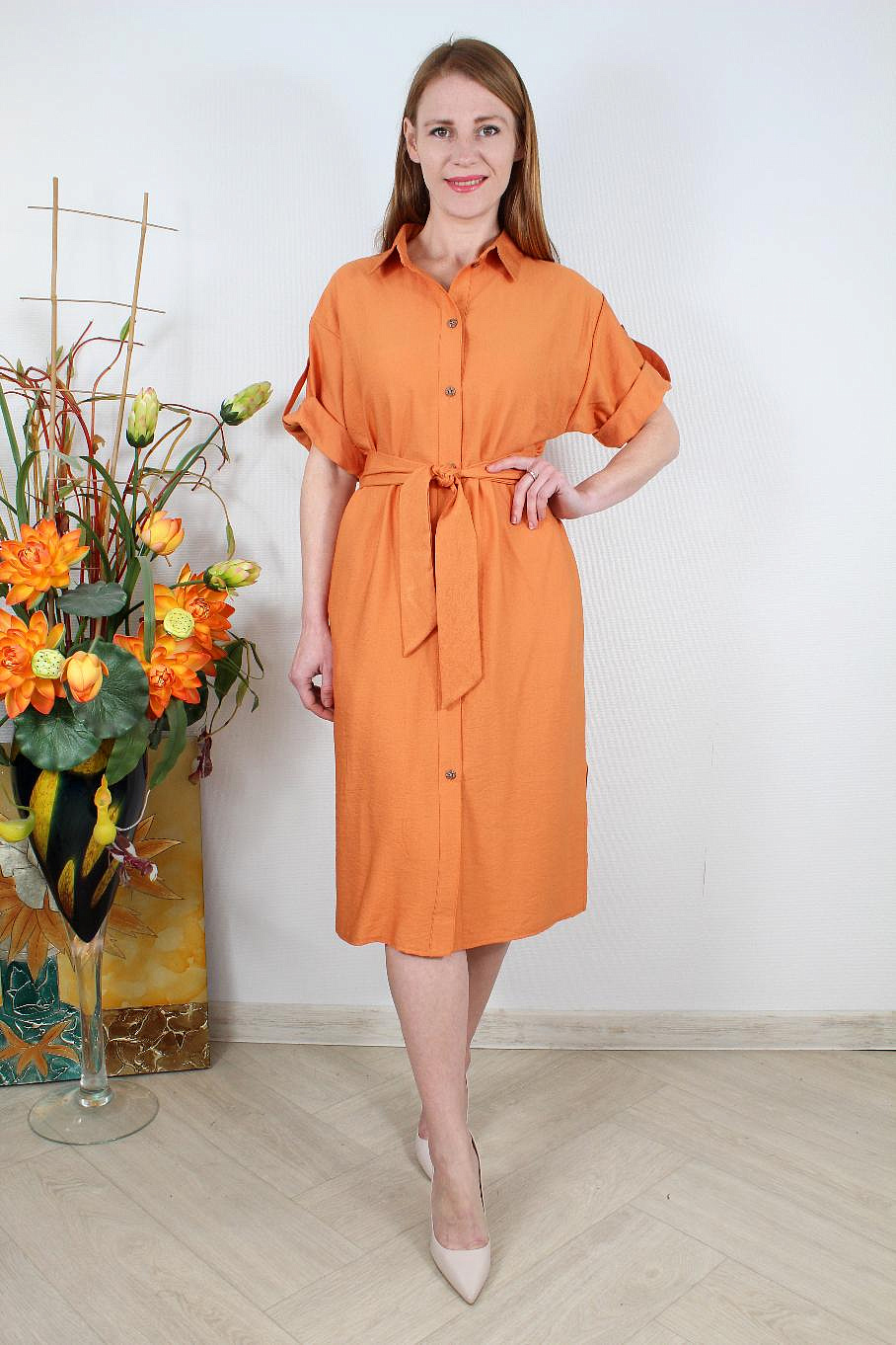 Женское платье на пуговицах